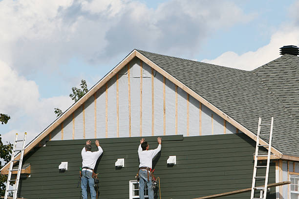 Professional Vinyl Siding technician working in Portage, PA